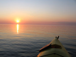 Kayaking on sunset